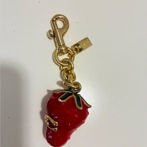 Authentic red strawberry coach bag charm  selling to pay bills